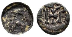 Visigothic Coins Nummus. Siglo VI. Toledo. (Cru-Grupo D, Tipo 44). Anv.: Bust on the right, in front of the cross and around the edge. Rev.: Monogram formed by two vertical lines from which hangs a cr