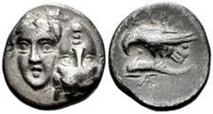 Greek Coins Moesia. Istros. Drachm. 313-280 BC. (Hgc-3.2, 1801). Anv.: Two young male heads facing, side by side, one inverted. Rev.: Sea-eagle to left, clutching dolphin in its talons between two pel