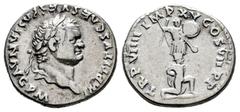Roman Imperial Titus. Denarius. 79-81 AD. Rome. (Ric-30). (Rsc-295). Anv.: IMP TITVS CAES VESPASIAN AVG P M. Laureate head right. Rev.: TR P VIIII IMP XV COS VII P P. Trophy; below, captive kneeling r