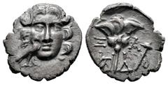 Greek Coins Caria. Mylasa. Drachm. 170-130 BC. (S-14, 196). Anv.: Facing head of Helios; to lower left and superimposed on cheek, eagle standing right. Rev.: Rose arround four monograms and scepter. A