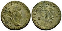 Roman Imperial Nero. Dupondius. 66 AD. Rome. (Ric-I 522). (Bmcre-353). Anv.: IMP NERO CAESAR AVG P MAX TR P P P, laureate head to right, globe at point of bust. Rev.: VICTORIA AVGVSTI, Victory advanci