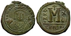 Byzantine Empire Mauricius Tiberius. Follis. 597-598 AD. Antioch. (Sear-533). (Doc-168b). Anv.: Facing bust of Maurice, wearing crown with pendilia and consular robes, holding mappa and eagle-tipped s