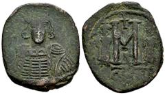 Byzantine Empire Constantine IV Pogonatus. Follis. 668-673 AD. Constantinople. (Doc-28a). (Mib-77). (SB-1173). Anv.: Helmeted and cuirassed bust facing, holding globus cruciger. Rev.: Large M between 