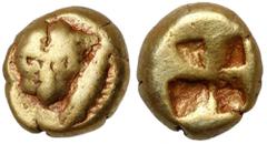 Ancient coins Greece, Mysia, Cyzicus, El Hemihekte (550-500 BC)Obverse: Facing head of panther; to right, tunny downward.Reverse: Quadripartite incuse square.Electron, diameter 7.5 mm, weight 1,29 g. 
