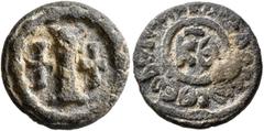 Byzantine Justinian I, 527-565. Decanummium (Lead, 16 mm, 3.50 g), RY 29 = 555/6 (?). Large I between two crosses; all within border of large pellets. Rev. +ΔIAΔOCЄⲰC ΘЄOΔOCIA ('distribution') around 