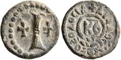Byzantine Justinian I, 527-565. Decanummium (Lead, 21 mm, 5.68 g, 12 h), RY 29 = 555/6 (?). Large I between two crosses; all within border of large pellets. Rev. +ΔIAΔOCЄⲰC ΘЄOΔOCIA ('distribution') a