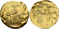 Byzantine John II Comnenus, 1118-1143. Hyperpyron (Gold, 32 mm, 4.00 g, 6 h), Constantinopolis. IC - XC Christ, nimbate, seated facing on square-backed throne, wearing tunic and pallium, raising his r