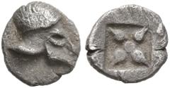 Greek IONIA. Uncertain. 5th Century BC. Tetartemorion (Silver, 5.5 mm, 0.18 g). Corinthian helmet to right. Rev. Star of four rays and central pellet within rectangular incuse. An enigmatic tiny coin 