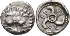 Greek DYNASTS OF LYCIA. Vekhssere II, circa 410-390/80 BC. 1/3 Stater (Silver, 17 mm, 3.13 g). Facing lion's scalp. Rev. 𐊇𐊀-𐊜𐊖-𐊖𐊁 ('Waxsse' in Lycian) Triskeles with central ring of dots; within