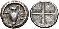 Greek MACEDON. Terone. Circa 424-422 BC. Tetartemorion (Silver, 7 mm, 0.21 g). T-E Oinochoe. Rev. Quadripartite incuse square with granulated recesses. Hardwick Group IV, 14. SNG ANS 755. Very fine. F