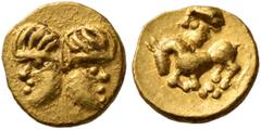 Greek CELTIC, Central Europe. Vindelici. Late 3rd or very early 2nd century BC. 1/24 Stater (Gold, 7 mm, 0.34 g, 5 h), 'Januskopf II' type. Head of Janus with thick strands of hair. Rev. Horse gallopi