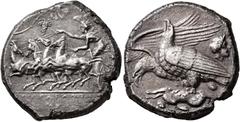 Greek SICILY. Akragas. Circa 409-406 BC. Tetradrachm (Silver, 25 mm, 16.67 g, 4 h). AKPAΓANTIΩN Nike driving quadriga galloping to left, holding the reins of two horses with her right hand, those of t