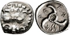 Greek DYNASTS OF LYCIA. Vekhssere II, circa 410-390/80 BC. 1/3 Stater (Silver, 15 mm, 3.05 g). Facing lion's scalp. Rev. 𐊇𐊁-𐊜𐊖𐊖𐊁-𐊕𐊁 ('wexssere' in Lycian) Triskeles with central ring of dots; 