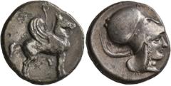 Greek CORINTHIA. Corinth. Circa 400-375 BC. Stater (Silver, 20 mm, 8.28 g, 8 h). Ϙ Pegasus standing right with curved wing, tethered to a ring fixed to a wall above him. Rev. Head of Athena to right, 