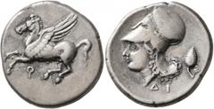 Greek CORINTHIA. Corinth. Circa 375-300 BC. Stater (Silver, 23 mm, 8.47 g, 12 h). Ϙ Pegasus flying left. Rev. Head of Athena to left, wearing Corinthian helmet; below, ΔΙ; behind neckguard, pine cone.