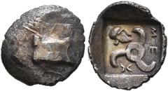 Greek DYNASTS OF LYCIA. Mithrapata, circa 390-370 BC. Obol (Silver, 11 mm, 0.54 g), uncertain mint. Astragalos. Rev. 𐊎𐊆-𐊉 ('Mith' in Lycian) Triskeles; to left, Corinthian helmet right; all within 