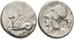 Greek AKARNANIA. Leukas. Circa 320-280 BC. Stater (Silver, 20 mm, 8.56 g, 7 h). [Λ] Pegasus flying left. Rev. Head of Athena to left, wearing Corinthian helmet; below, monogram of ΑΓ; behind neck guar