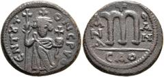 Early Medieval & Islamic ISLAMIC, Time of the Rashidun. Pseudo-Byzantine types. Fals (Bronze, 22 mm, 6.09 g, 12 h), imitating the EN T૪TO NIKA follis of Constans II, before AH 24 = AD 645. ЄN T૪TO NCP