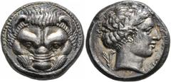 Greek BRUTTIUM. Rhegion. Circa 415/0-387 BC. Tetradrachm (Silver, 23 mm, 16.75 g, 7 h). Facing head of a lion. Rev. ΡHΓINON Head of Apollo to right, wearing laurel wreath; behind, olive sprig. Gillet 