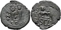 Byzantine Heraclius, with Heraclius Constantine and Heraclonas, 610-641. Follis (Bronze, 32 mm, 10.33 g, 6 h), mint in Sicily, 631. Countermark: on the left, facing half-length bust of Heraclius, with