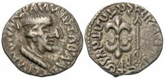 Ancient Indian Coins Nahapana. Ca. A.D. 53-99. AR drachm (16 mm, 2.20 g). King's bust right, with Greek legend around / Stylized thunderbolt and arrow, with Brahmi legend Rajno Kshaharatasa Napanasa i