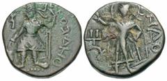 Ancient Indian Coins Kanishka I. A.D. 127/8-ca. 147. Æ unit (16 mm, 3.86 g). Crowned king standing facing, holding spear and sacrificing at altar at left; Baktrian legend þAO KA/NIþKI (King Kanishka) 