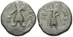 Ancient Indian Coins India, Kushan Empire. Kanishka I. Ca. A.D. 127/8-152. Æ tetradrachm (27 mm, 17.01 g). King standing, head left, sacrificing over altar and holding spear; traces of Bactrian legend
