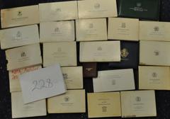 FOREIGN COINS. Modern Proof and Uncirculated Franklin Mint Coin Sets: Netherlands Antilles, Gold 200-Guilders, 1977; Silver etc: Bahamas, 1974; Barbados (2), 1974, cases damaged ; Belize (3), 1974, 19