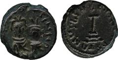 ISLAMIC COINS. Arab Byzantine. Arab Latin, Two Imperial Busts, Copper Fals, North African mint, undated, 13mm, 2.84g (Walker p.58:156; A 118). Extremely fine and very rare. ex Spink-Zürich auction, 20