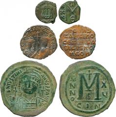 ANCIENT BYZANTINE COINS , Justinian I (AD 527-565), Æ Follis, mint of Constantinople, helmeted and cuirassed bust facing, rev large M , flanked by ANNO and XU , officina B , CON in exergue (S 163); Co
