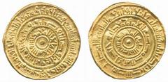 Fatimid No.: 184 Estimate: £ 250 al-Mustansir, Dinar, Trablus 443h, 3.63g (KLC 1135-1136). Struck from slightly rusted dies, about extremely fine, the date rare. £250-300