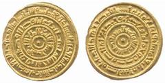 Fatimid No.: 194 Estimate: £ 140 al-Mustansir, Dinar, Misr 453h, without pellet above 3 of date, 4.31g (BMC IV:162 var; Miles 356 var). Extremely fine. £140-160