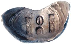 COINS CHINA Sycees / Ingots No.: 136 Estimate: US$ 250 CHINA, ANCIENT CHINESE COINS, Sycees / Ingots, Qing Dynasty: Silver 2-Taels Sycee, boat-shaped, stamped "(Russo-Chinese Bank) and an oval symbol,