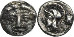 ANCIENT COINS Greece, Pisidia, Selge, ObolIn the catalog, the coin is described as a barbaric imitation. Greece Pisidia, Selge, Obol 350-300 BC Obverse: facing gorgoneion with protruding tongueReverse