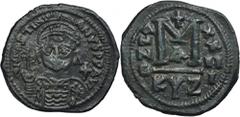 ANCIENT COINS Byzantine Empire, Justinian I, FollisByzantine EmpireJustinian I (527–565), Follis 550-551, KyzikosObverse: cuirassed bust facing, holding globe and shield, cross in right field D N IVST