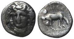 Greek Coins Thessaly, Larissa, 356 - 337 BC Silver Obol, 10mm, 0.64 grams Obverse: Head of the nymph Larissa facing slightly left with ampyx in her hair. Reverse: Horse with straight legs grazing righ