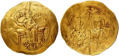 Monete Bizantine Giovanni II Comneno (1118-1143) - Hyperpyron - Zecca: Costantinopoli - Diritto: Gesù Cristo benedicente seduto di fronte - Rovescio: l'Imperatore stante di fronte con labarum nella ma