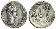Θ Caligola (37-41 d.C.) - Dracma databile agli anni 37-38 d.C. Zecca: Caesarea (Cappadocia) - Fronte: testa dell'Imperatore a destra - Retro: due strumenti sacrificali affiancati: a sinistra il simpul