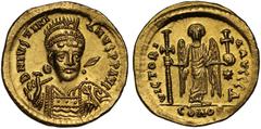 Ancient Coins Justinian I (A.D. 527-565), gold Solidus, mint of Constantinople, D N IVSTINIANVS PP AVG, pearl-diademed, helmeted and cuirassed bust facing, slightly inclined to the right, holding a sp