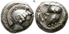 Greek Attica. Athens circa 500-485 BC. Tetradrachm AR 21mm., 17,59g. Head of Athena with profile eye to right, wearing disc earring, and a crested Attic helmet / [Α]ΘΕ, owl standing to right, head fac
