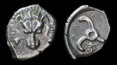 Greek DYNASTS OF LYCIA: Perikles (c. 380-360 BC), AR 1/3 Stater/tetrobol. 3.11g, 19mm. Obv: Facing lion's scalp. Rev: 𐊓𐊁𐊕-𐊆𐊋𐊍-𐊁 ('Perikle' in Lycian) Triskeles; below, facing head of Hermes wea