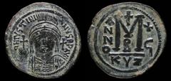 Byzantine & Crusader Justinian I (527-565) AE follis, issued 542/3 (year 16). Cyzicus, 19.81g, 38mm. Dated year 16 (542/3 AD). Obv: D N IVSTINIANVS P P AVI; Diademed, helmeted and cuirassed bust facin