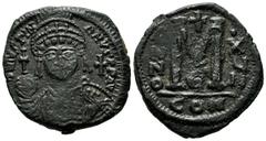 Byzantine Coins Justinian I. 527-565 AD. AE Follis (32mm, 18.90g). Constantinople mint, 5th officina. Dated RY 17. DN IVSTINIANVS PP AVG, Helmeted, draped, and cuirassed bust facing, holding globus cr