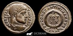 Roman Empire Constantine Bronze Follis 3,38 g., 19 mm. Arles 321 A.D. nEF Roman Empire - Constantine I (306-337 A.D.) - follis (3,38 g., 19 mm.). Arles mint A.D. 321. CONSTA-NTINVS AVG, laureate head 