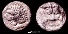 Ancient Greek Greek CARIA. Mylasa. Circa 420-390 BC. Obol (0,46 g, 8 mm), Milesian standard. Forepart of a roaring lion to right, head turned back to left. 𐤷 ('w' or 'y' in Carian) Facing forepart of