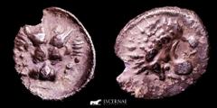 Ancient Greek Greek CARIA. Mylasa. Circa 420-390 BC. Obol (0,37 g, 7 mm), Milesian standard. Forepart of a roaring lion to right, head turned back to left. 𐤷 ('w' or 'y' in Carian) Facing forepart of