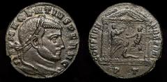 Roman Imperial Coins Maxentius. A.D. 306-312. AE follis (26 mm, 7.82 g.). Ticinum mint, struck A.D. 308-310. IMP MAXENTIVS P F AVG, laureate head right / CONSERV VRBS VAE, tetrastyle temple with Victo