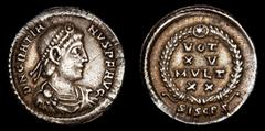 Roman Imperial Coins Roman Empire - Gratian, (367-383 A.D). Silver siliqua, Siscia mint. VOT / XV / MVLT / XX / SISCPS. DN GRATIANVS P F AVG. His pearl-diademed, draped, and cuirassed bust right; VOT 