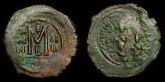 Islamic Coins Heraclius and Heraclius Constantine, AE Follis. Constantinople. 610-641 AD. Heraclius, bearded, on left, and Heraclius Constantine, on right, standing facing, both crowned and cuirassed,