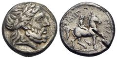 GRIECHISCHE MÜNZEN MACEDONIA Könige von Makedonien Philippos II. (359-336) Tetradrachme posthum, circa 323-315 Amphipolis Av.: Belorbeerter Kopf des Zeus nach rechts. Rv.: FILIP-POY, Reiter mit Palmzw